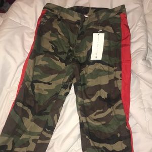 Camo pants with red stripes